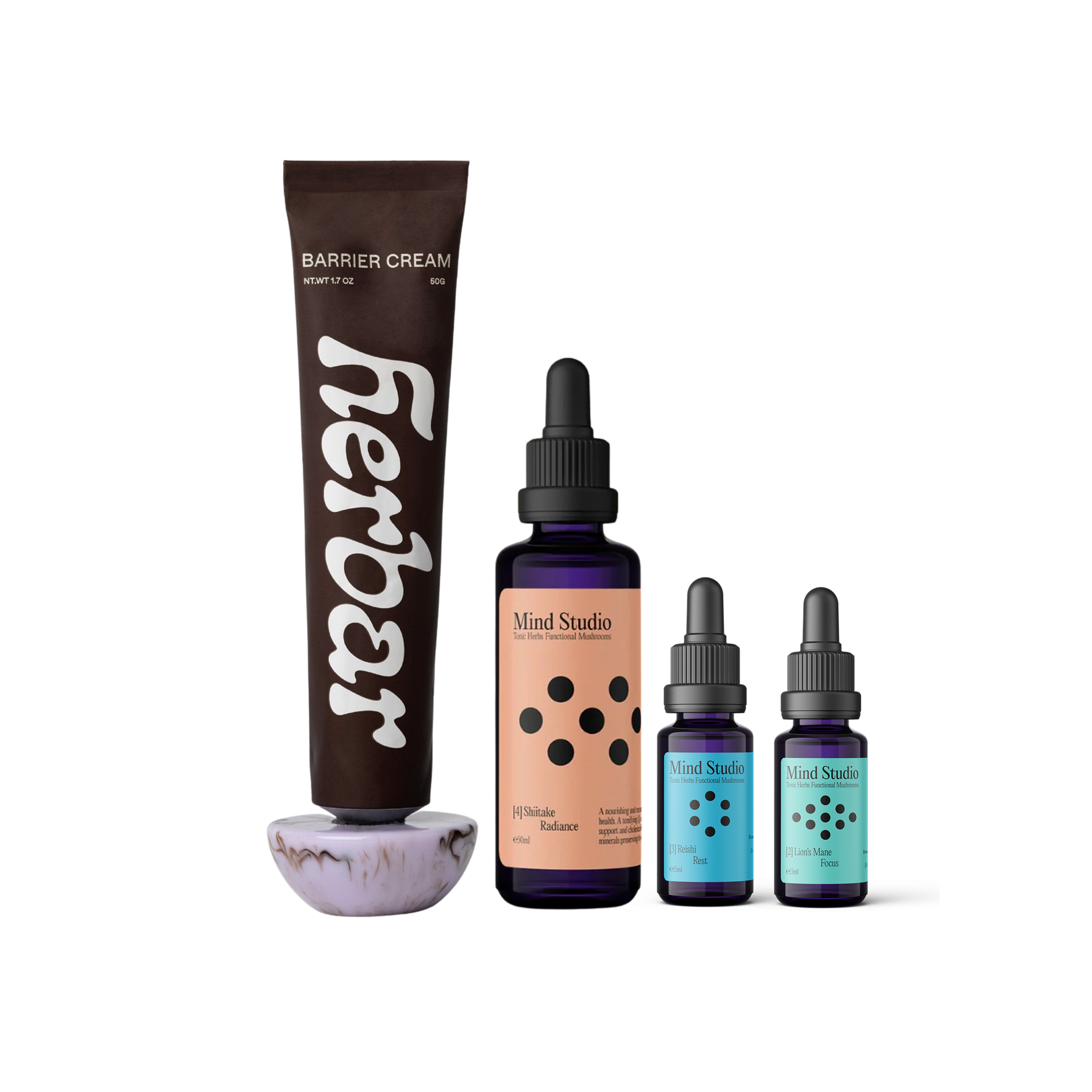 Herbar barrier cream and Mind Studio dropper bottles on a white background