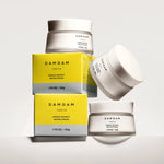 Stacked DAMDAM Ginkgo Bouncy Water Cream jars and yellow boxes