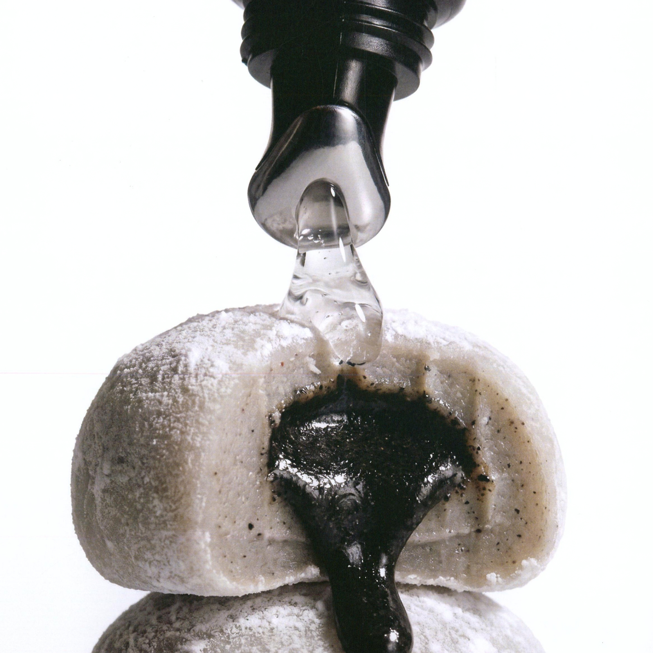 Herbar The Lip Butter Black Sesame tube with black sesame mochi, the dessert that inspired its flavour