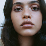 Model wearing Manasi 7 All Over Colour Manketti for a neutral, polished look on lips, cheeks and eyes