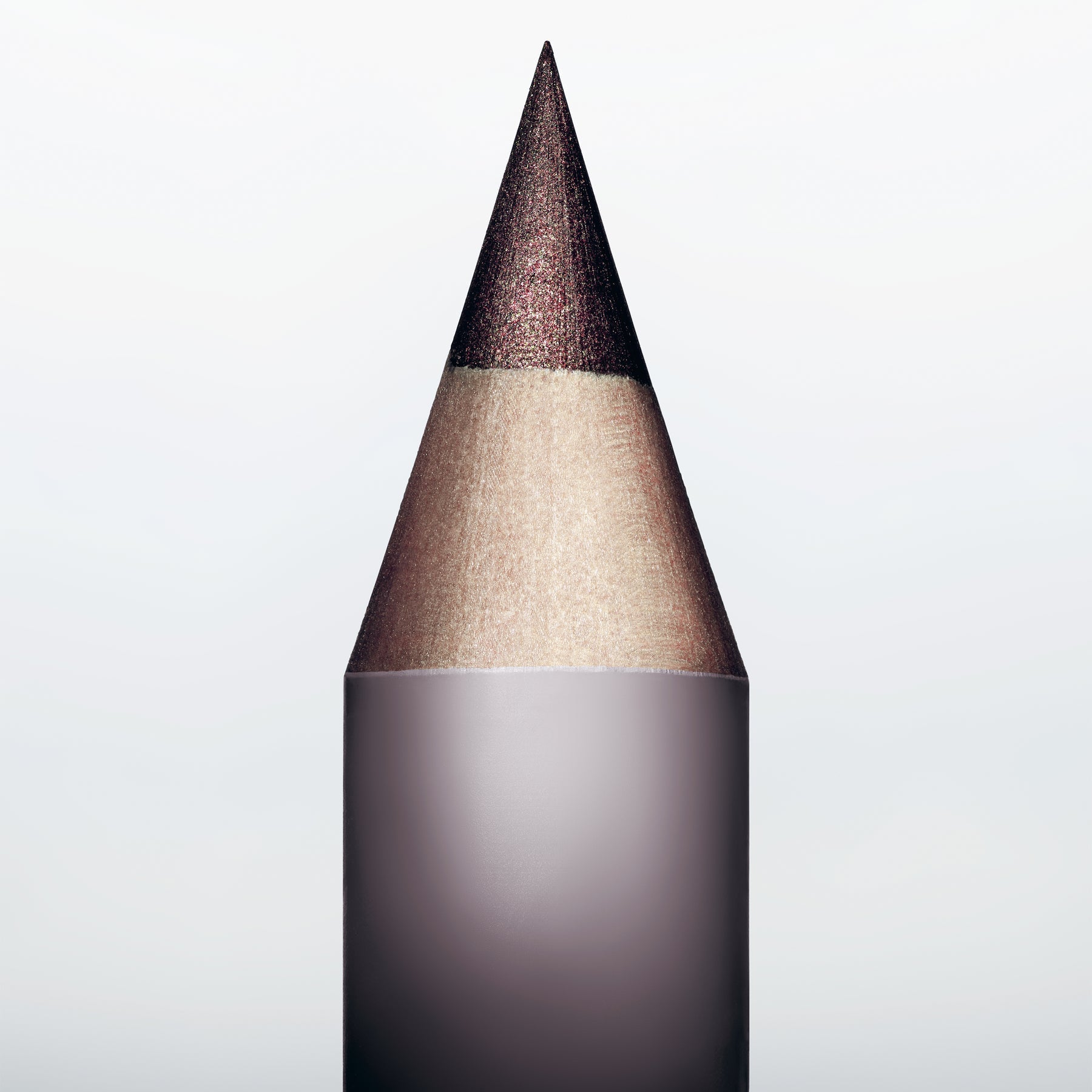 Sharpened tip of Manasi 7 Eye and Lip Definer Nocturne against a soft dark background