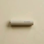 RAESO Tranquillity Water Activating Mist mini lying on a soft beige background