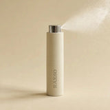 RAESO Tranquillity Water Activating Mist mini releasing a fine cloud of hydrating mist
